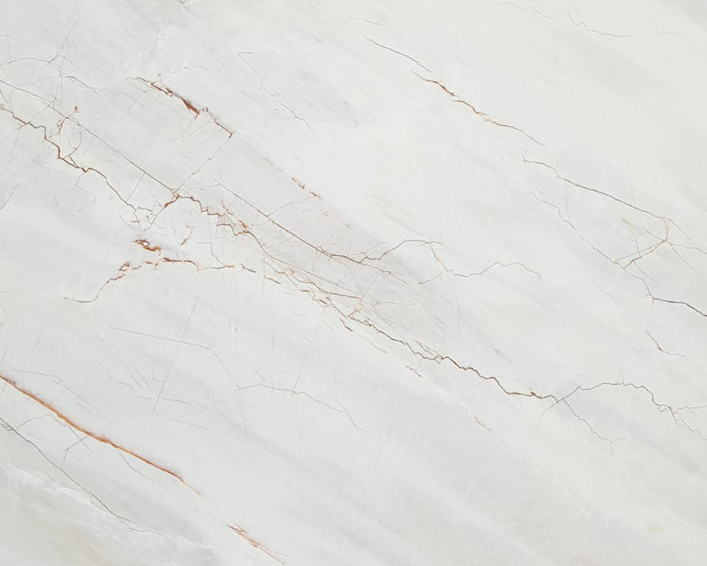 White Marble with red veining.