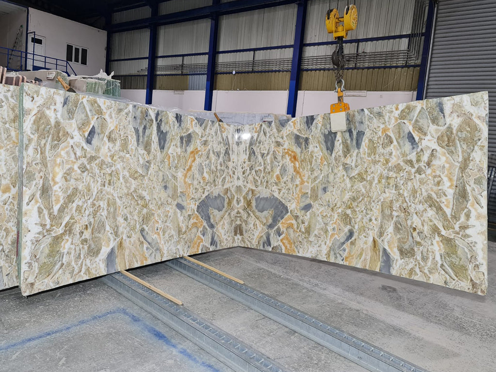 Blue, gold & white marble book matched