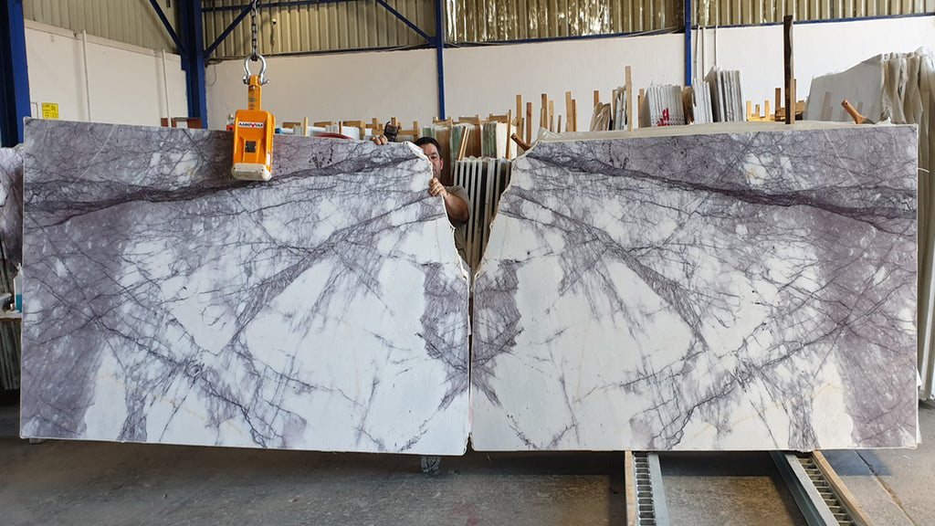 White & gray marble with purple veining slabs book matched