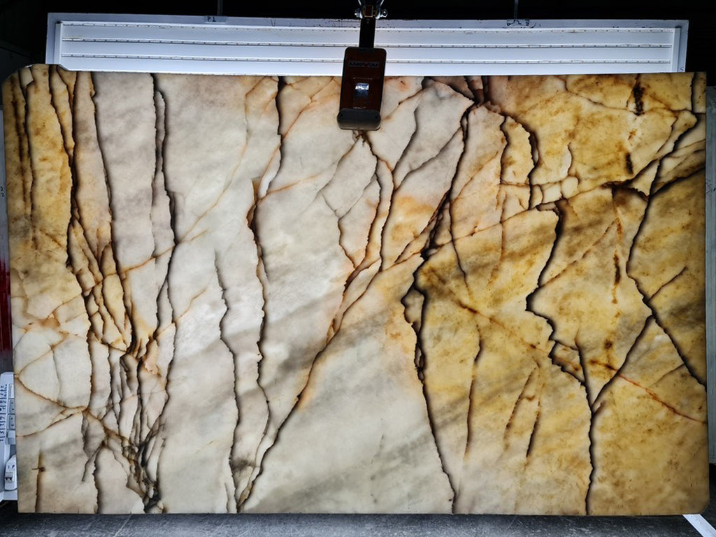 Cream & gray stone with dark veining back lit