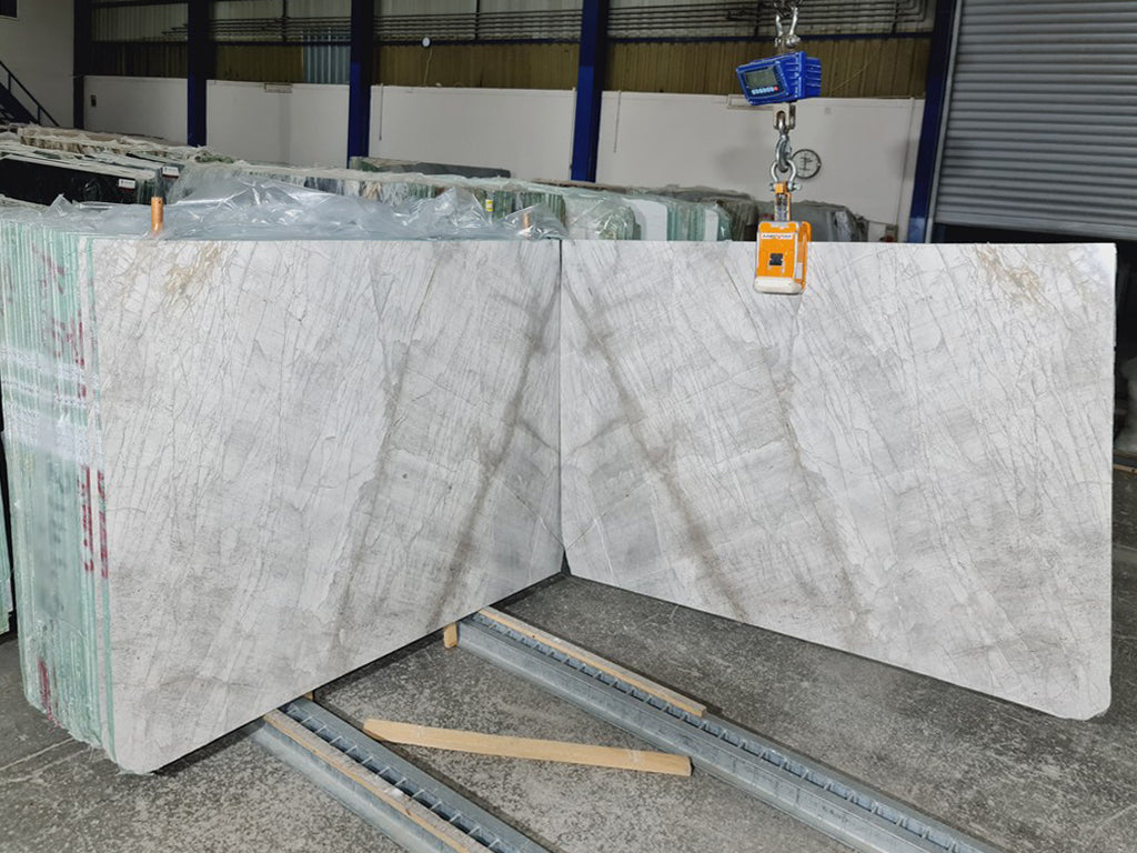 Gray stone with white veining slabs book matched