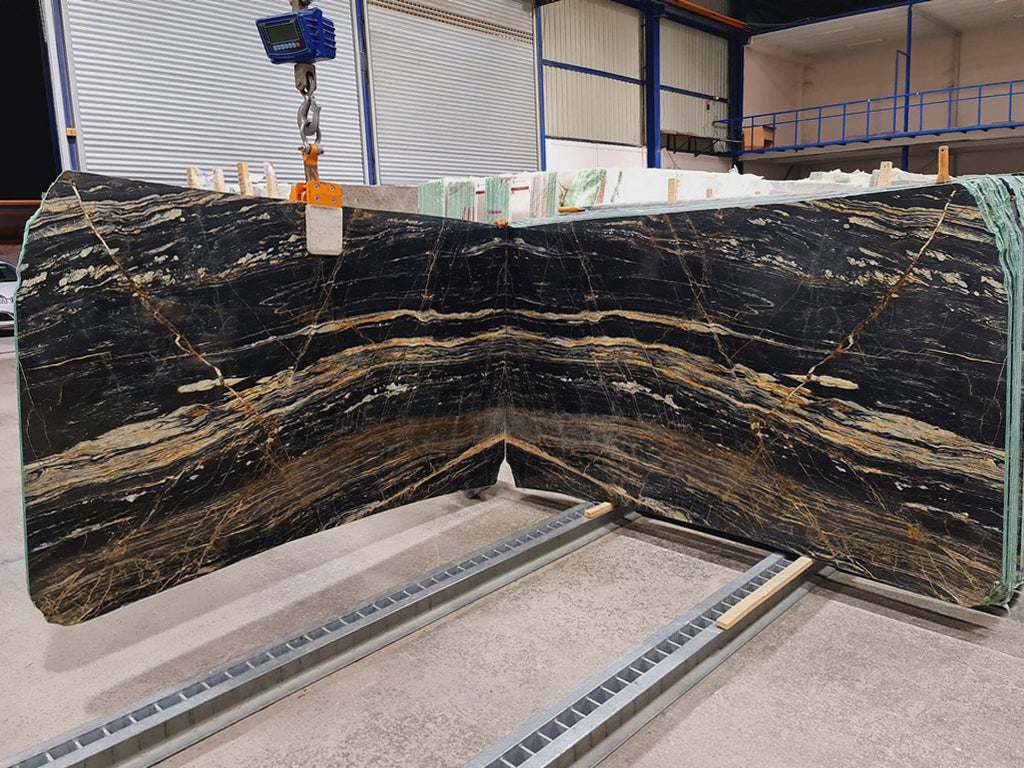 Black Marble with gold veining slabs book matched