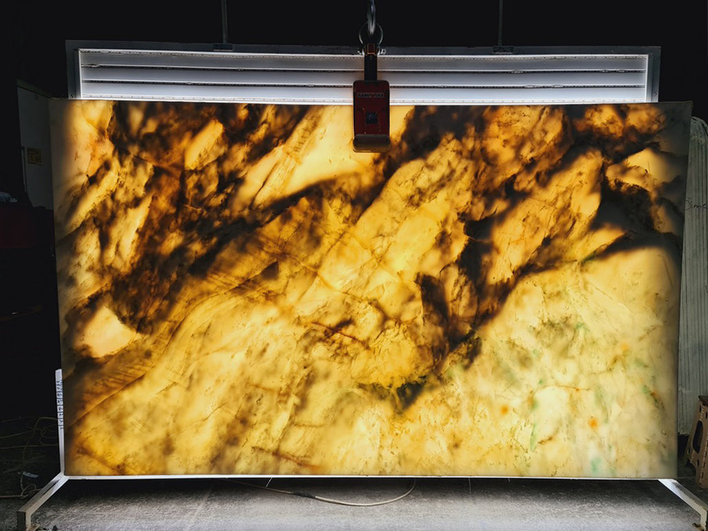 White marble with green veining back lit slab