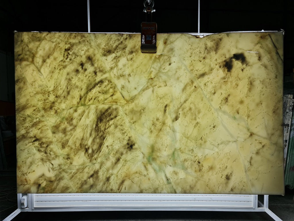White marble with green veining back lit slab