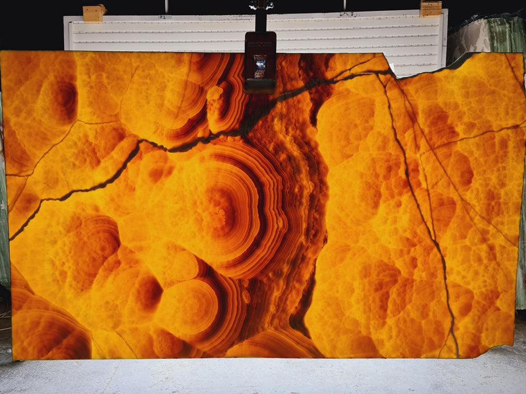 Orange onyx with Malachite veining slab back lit