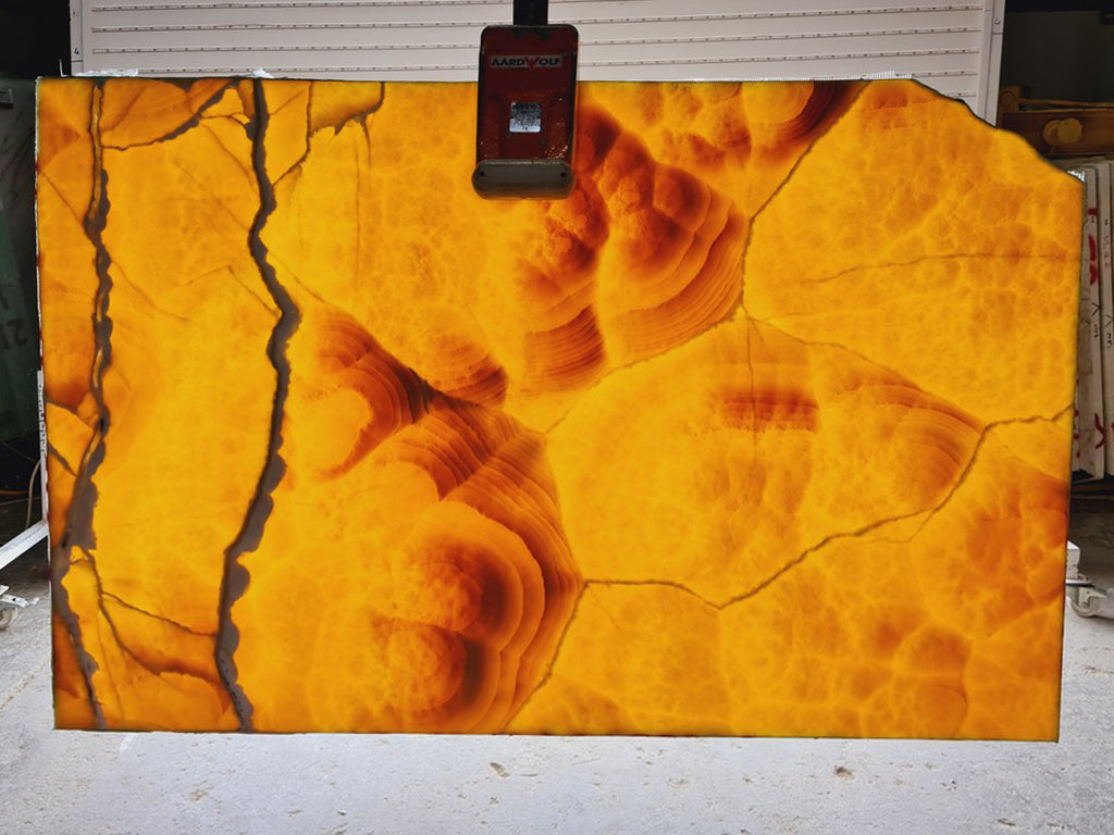 Orange onyx with Malachite veining slab back lit