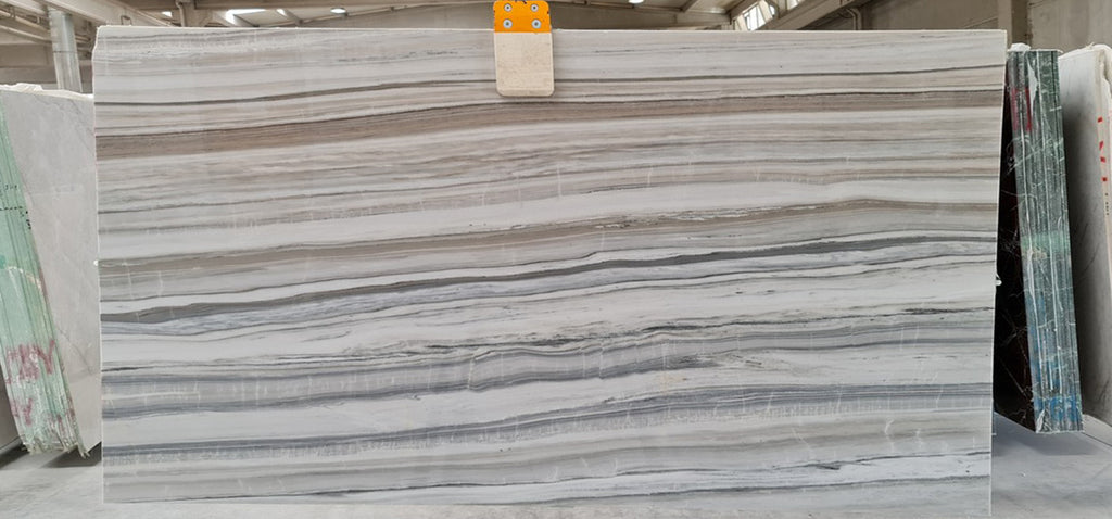 White marble with beige and gray veining slab