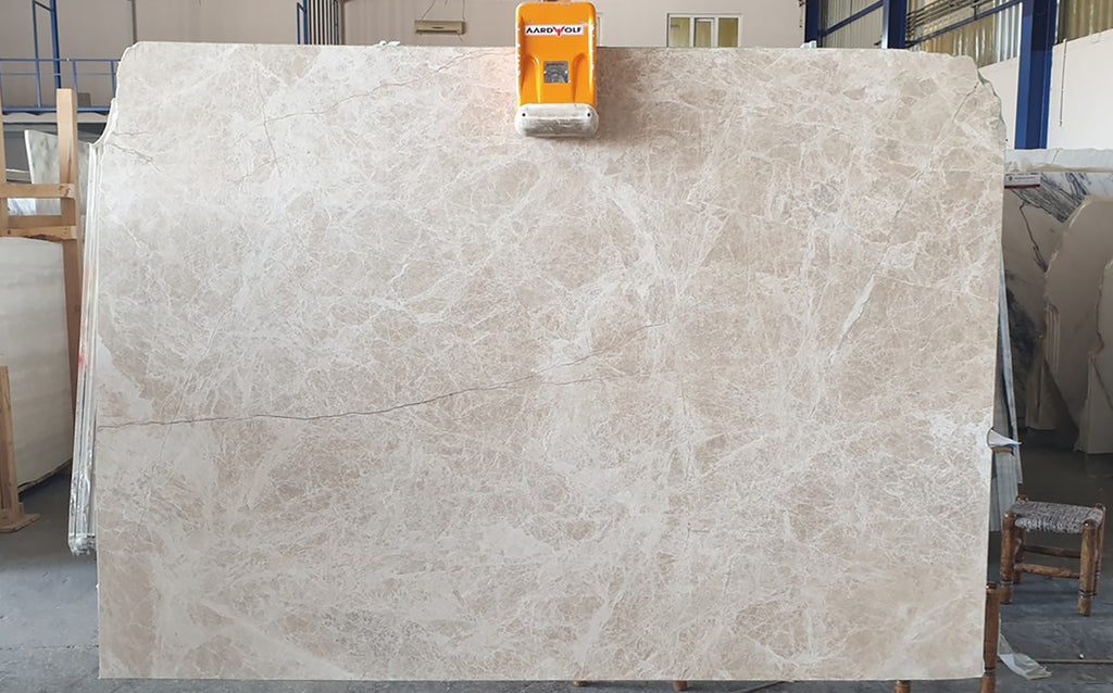 Beige marble with white veining slab