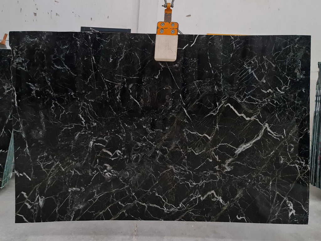 Dark green stone with white veining slab