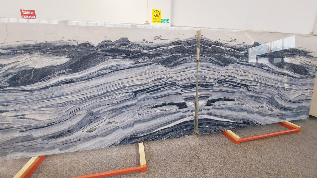 Blue marble with light and dark veining slabs book matched