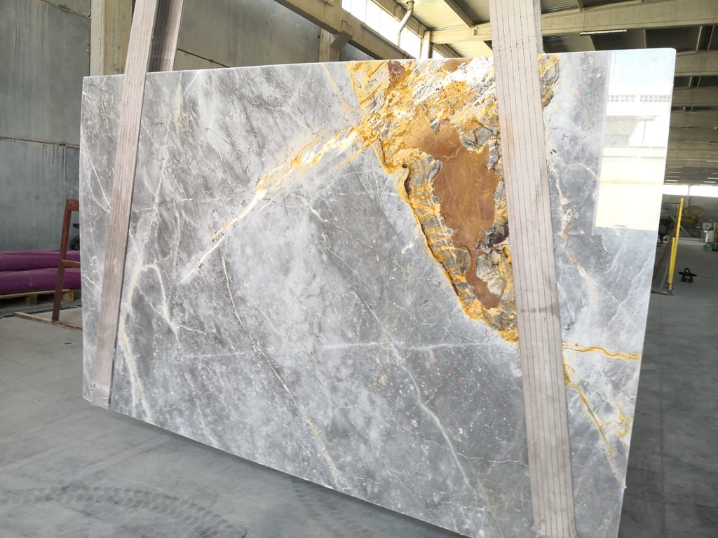 Gray marble with gold veining slab