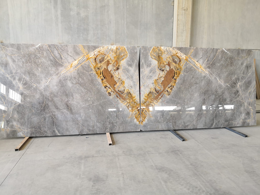 Gray marble with gold veining slabs book matched