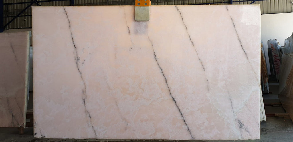 Pink onyx with black veining slab