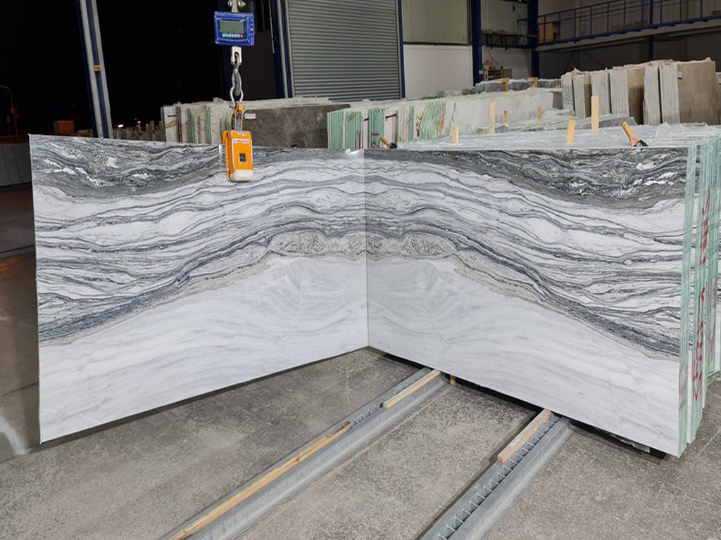 Cream stone with  gray veining slabs book matched