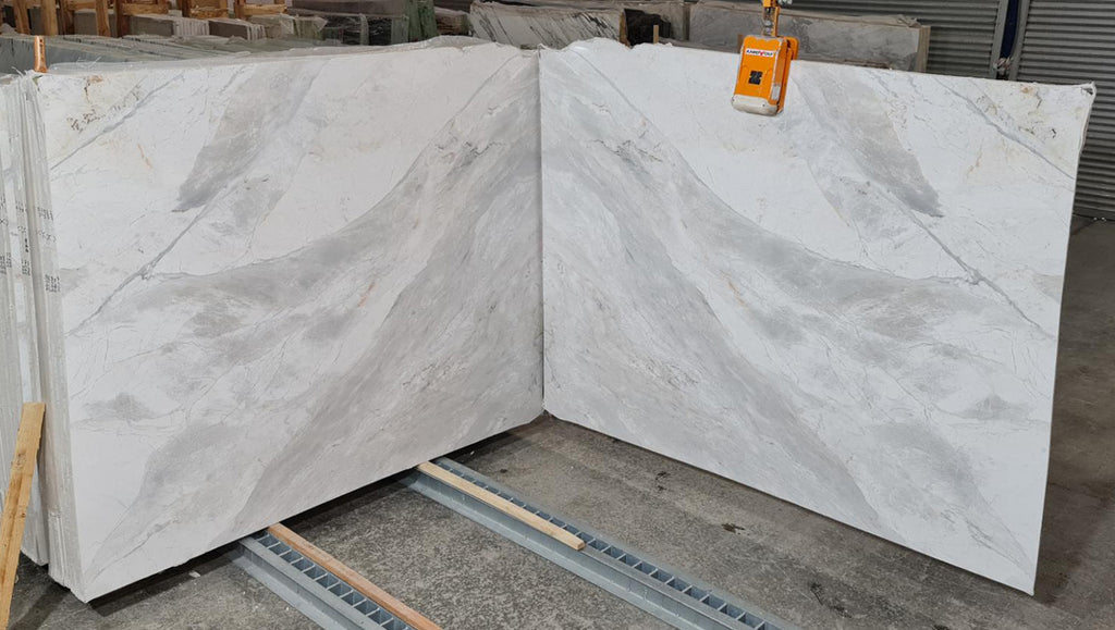 Marble with white and gray veining slabs book matched
