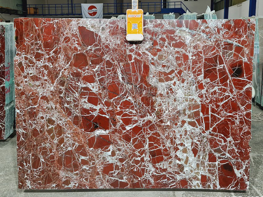 Red marble with white veining slab