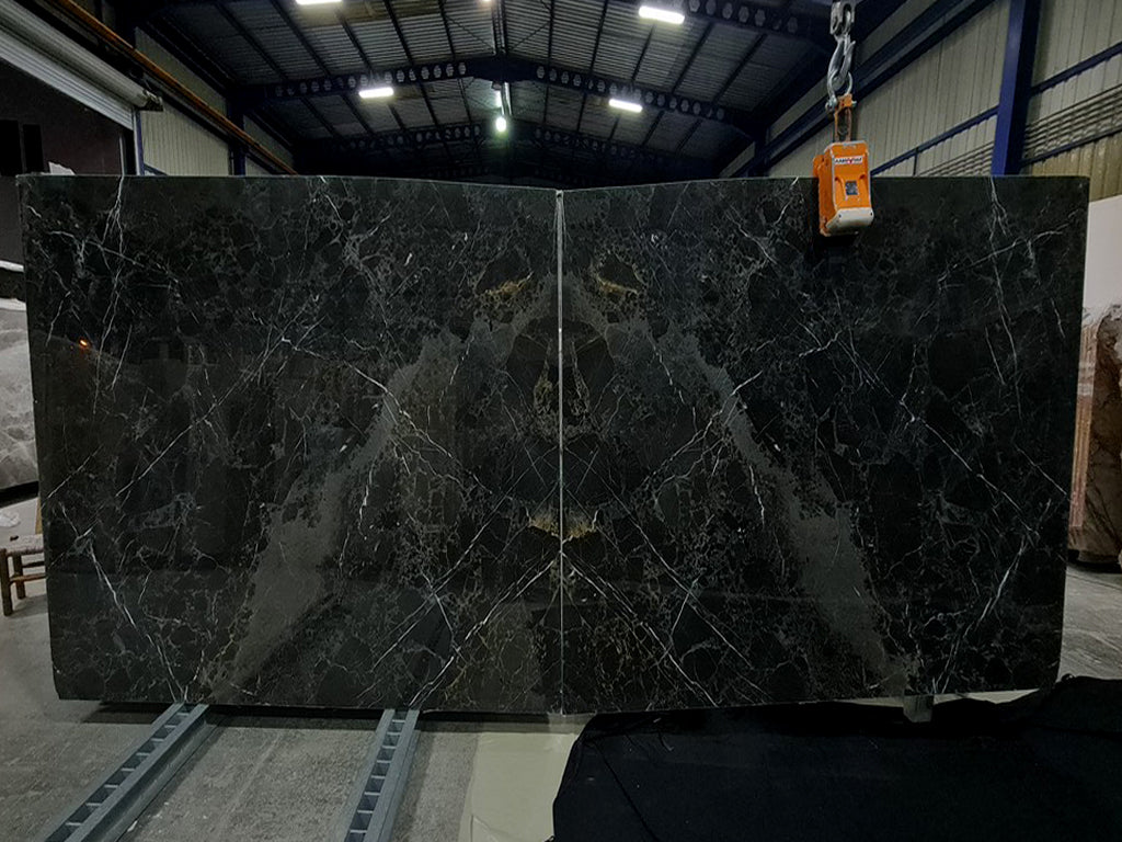 Black Marble with white and gold veining slabs book matched