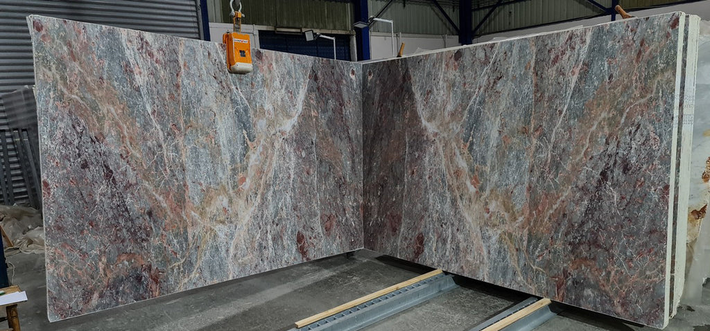 Multi colored marble slabs book matched