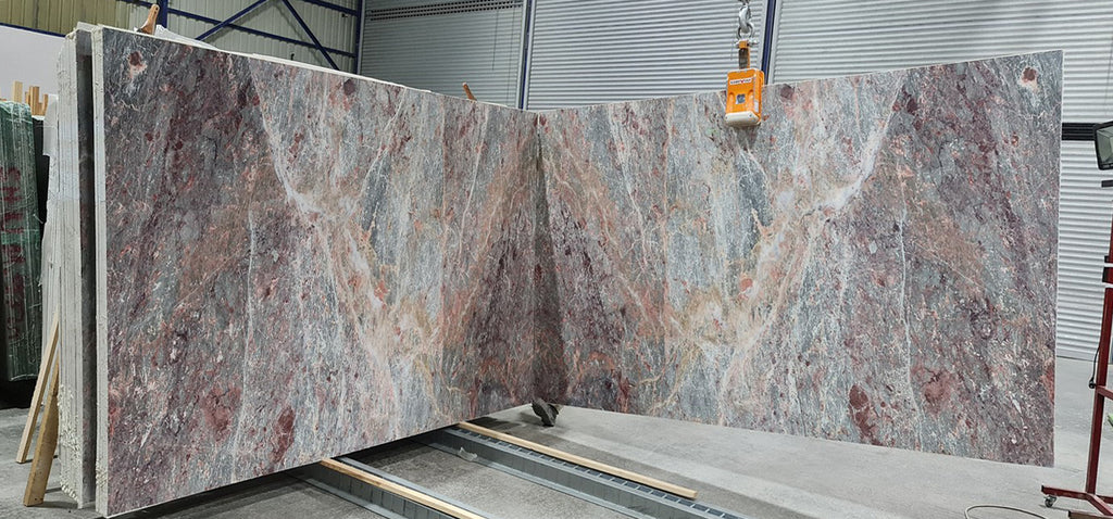 Multi colored marble slabs book matched