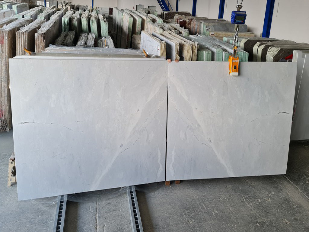 Gray marble with white veining slabs book matched