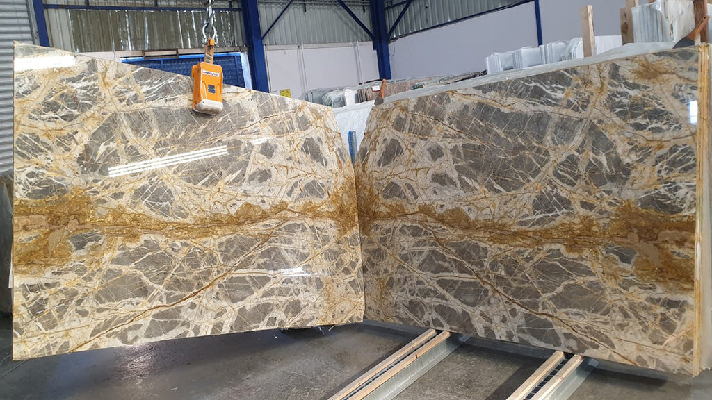 Gray Marble with gold veining slabs book matched