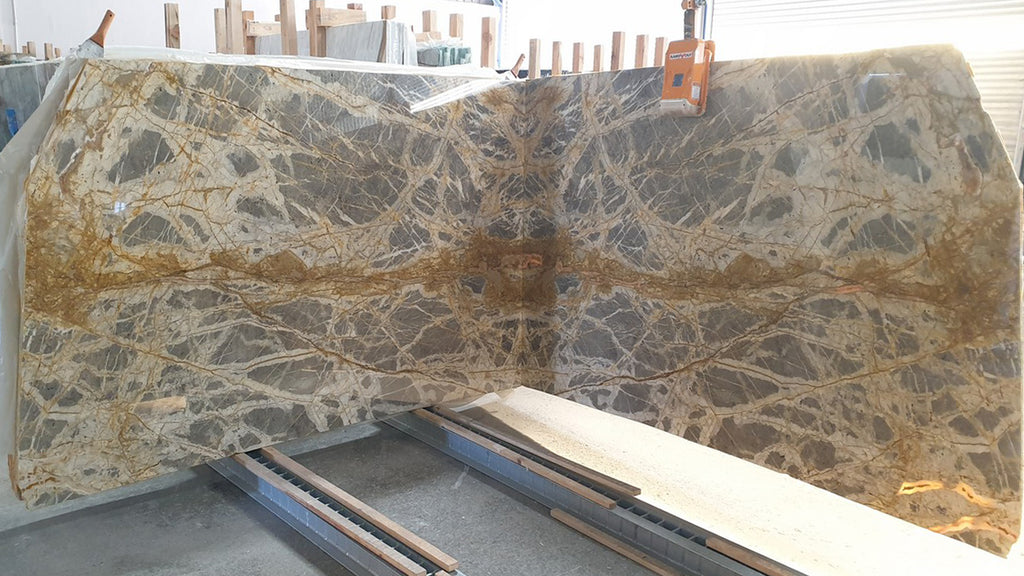 Gray Marble with gold veining slabs book matched