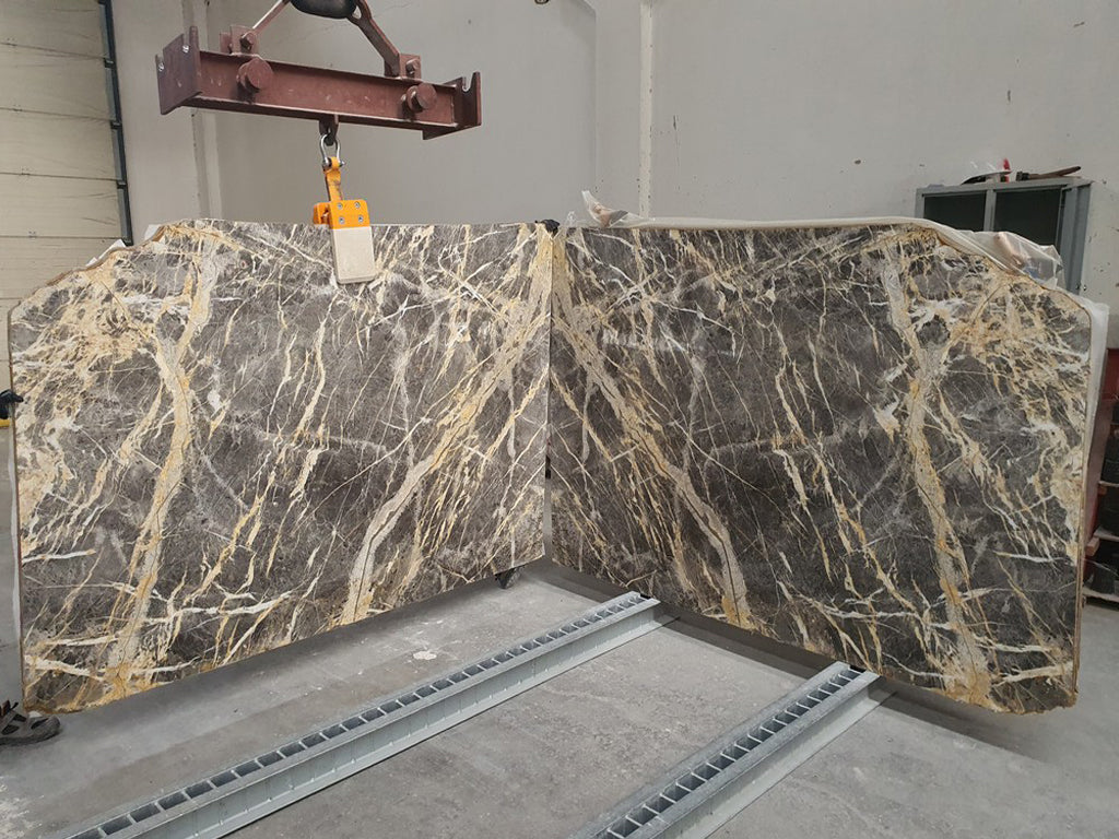 Black Marble with gold veining slabs book matched