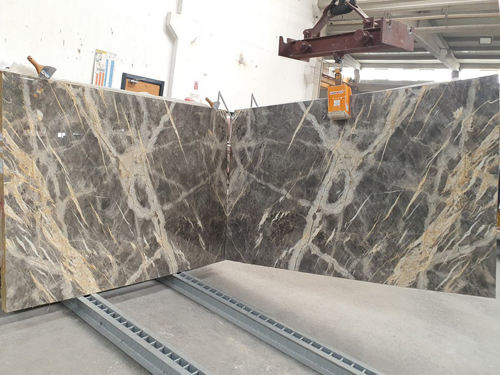 Black Marble with gold veining slabs book matched