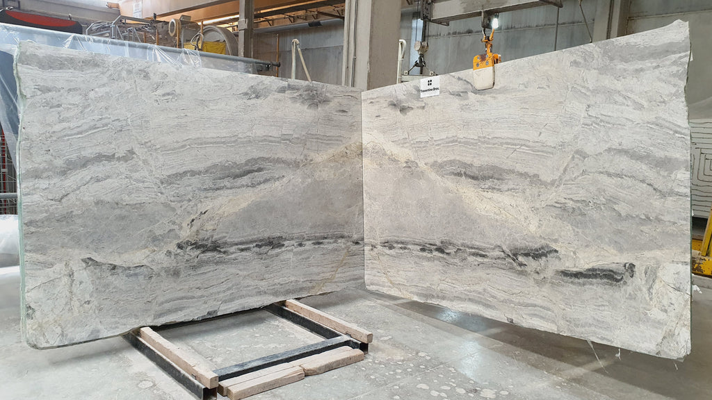 Gray / Cream stone with gold and black veining slab book matched
