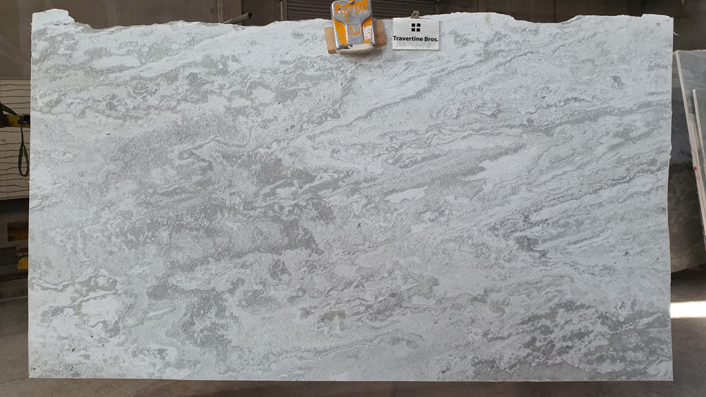 Grey stone with cloudly gray accents.
