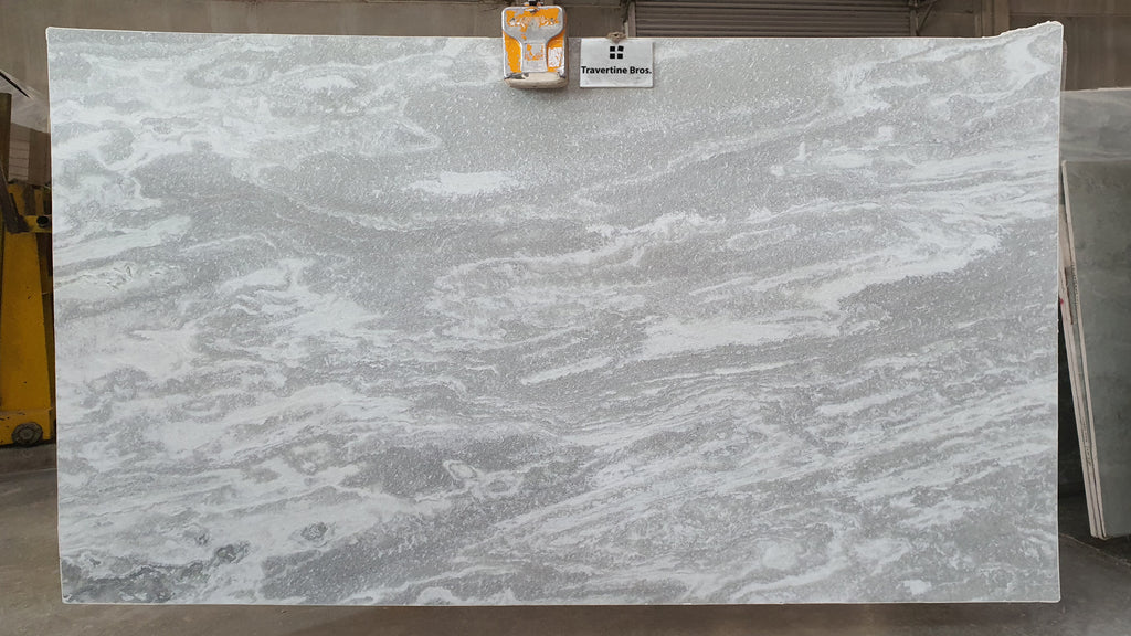 Grey stone with cloudly gray accents.