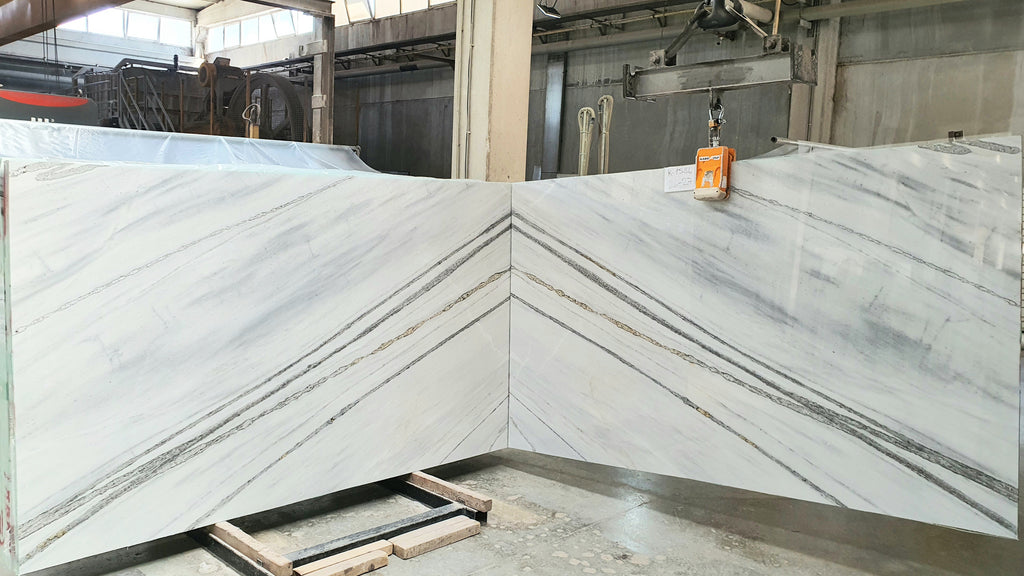 White stone with black veining slabs book matched