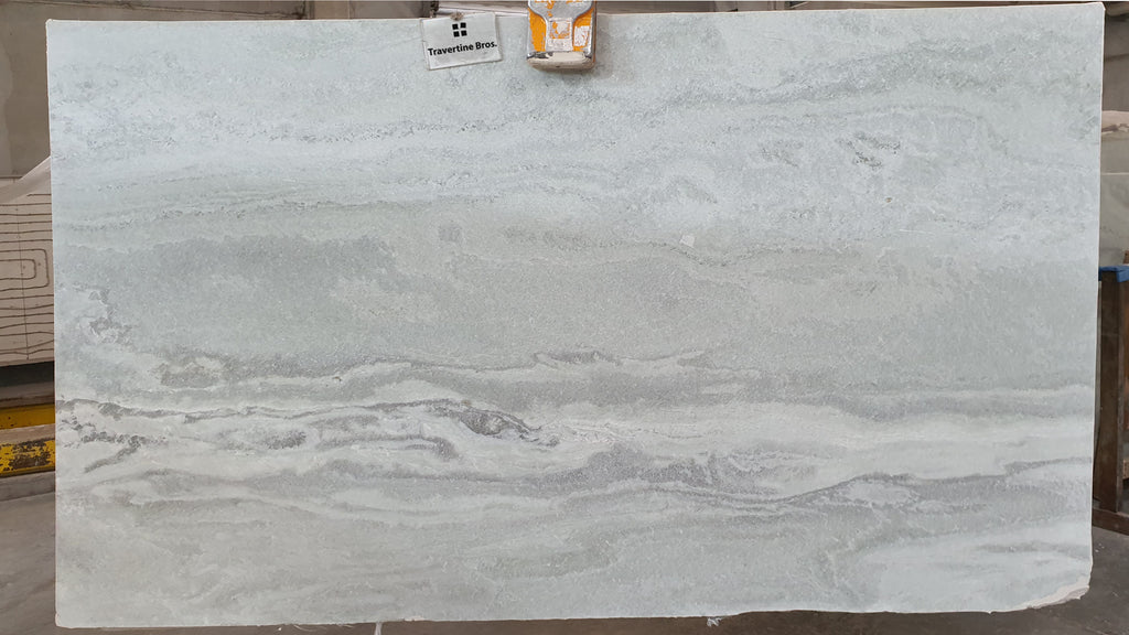 Grey stone with cloudly gray accents.