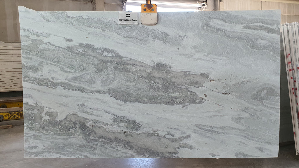 Grey stone with cloudly gray accents.