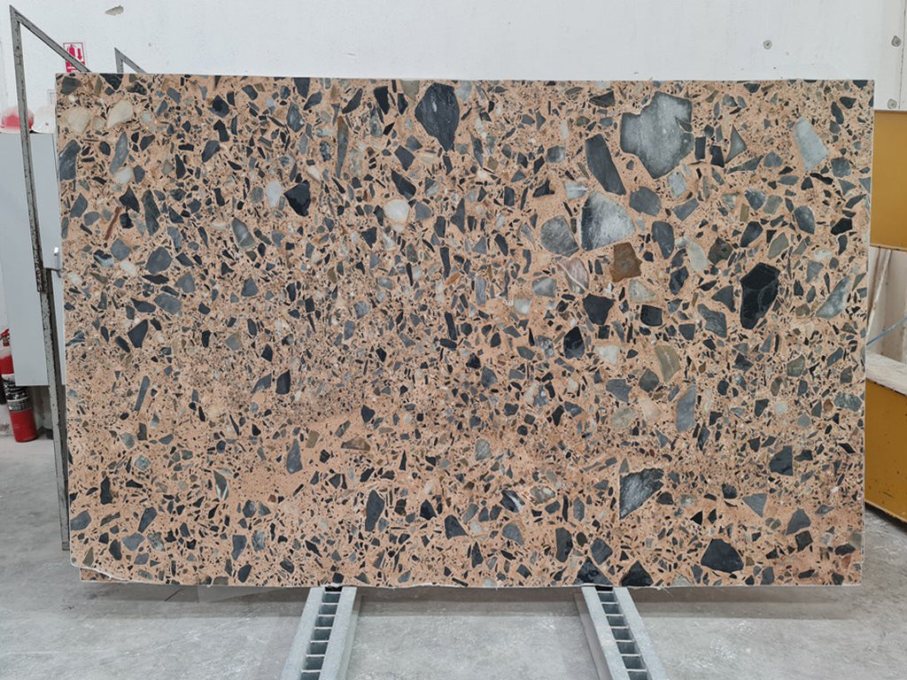 Pink marble with pebble textures slab