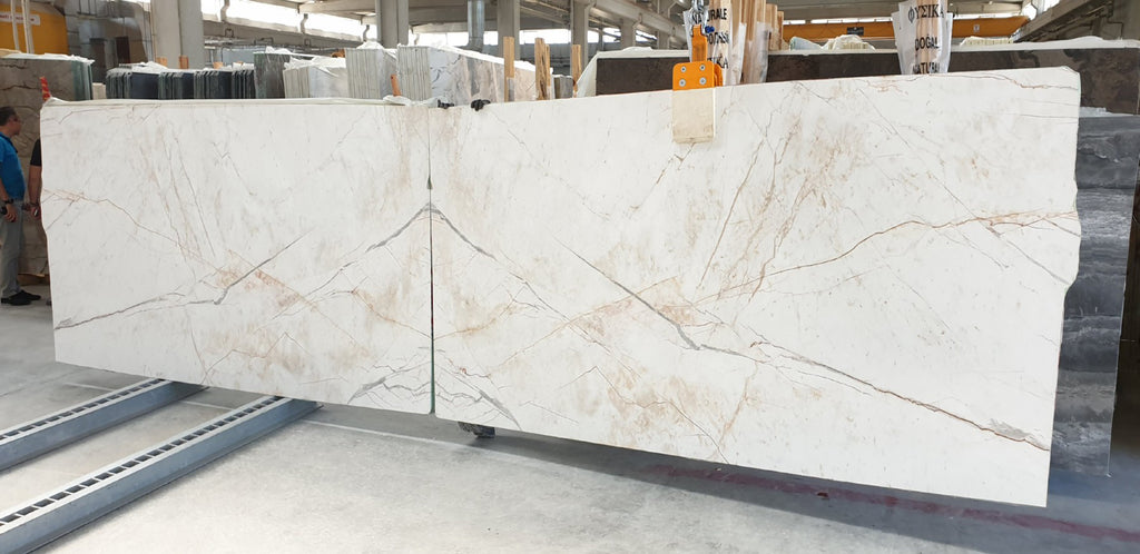 Beige marble with veining slab book matched