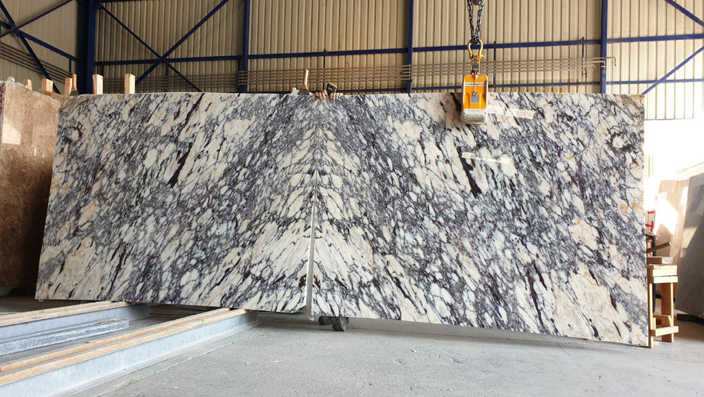 White marble with purple veining slabs book matched