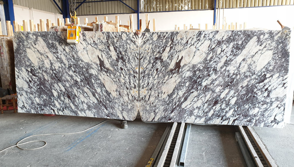 White marble with purple veining slabs book matched
