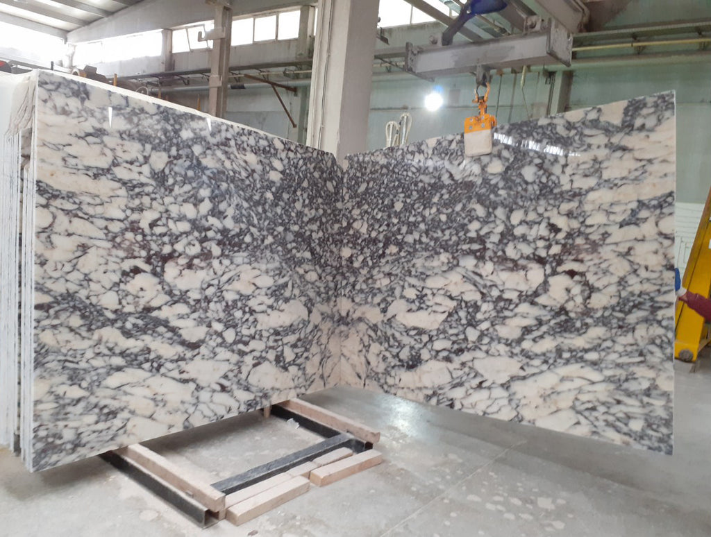 White marble with purple veining slabs book matched