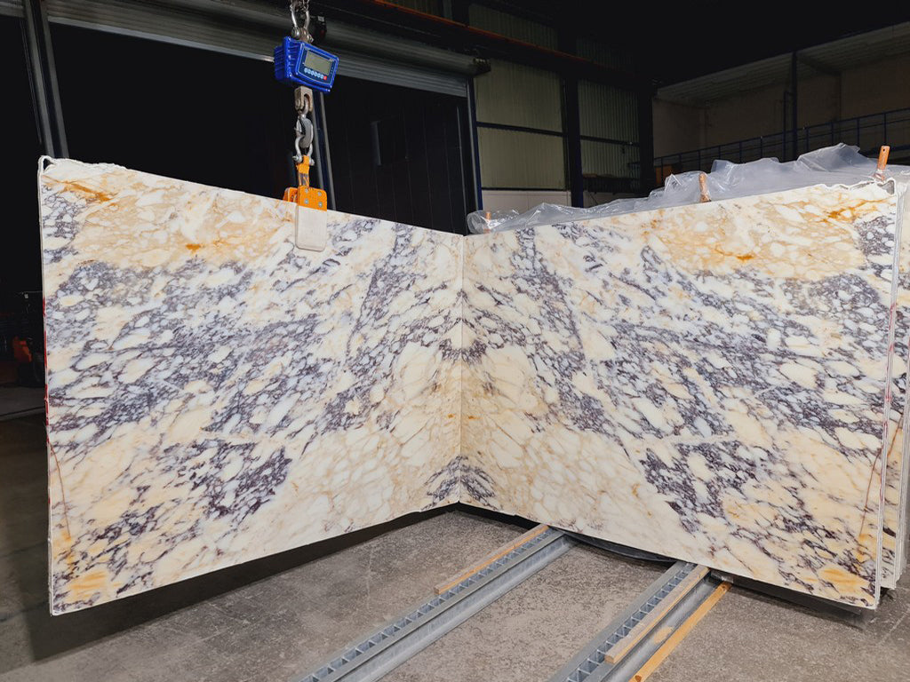 White marble with purple veining slabs book matched