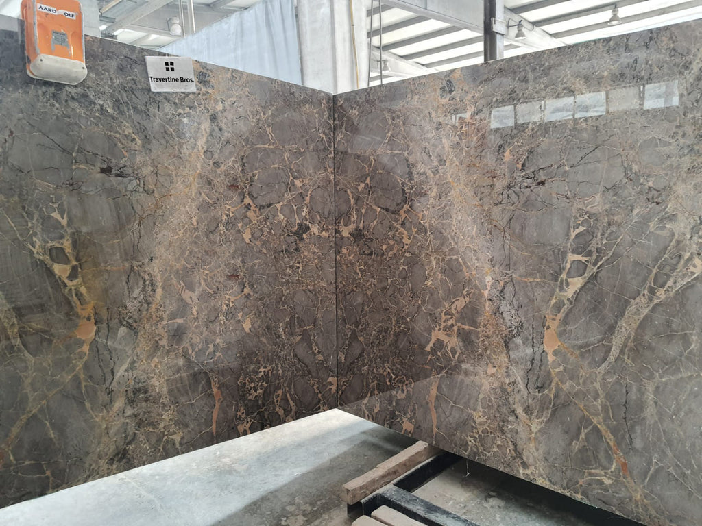 Gray marble with gold veining slabs book matched