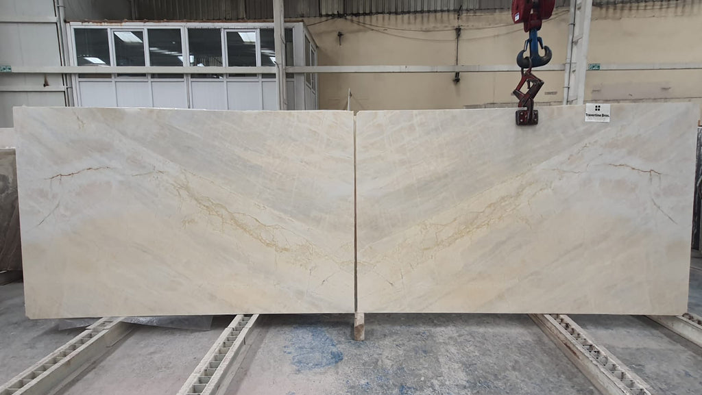 Marble slabs with yellow, cream & beige tones  book matched